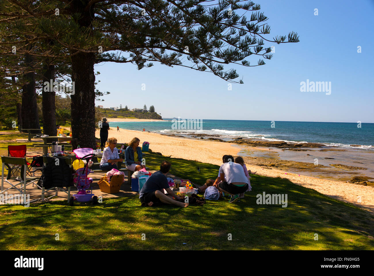 Picnickers at Moffatt Beach at Caloundra on the Sunshine Coast in Queensland, Australia. Stock Photo