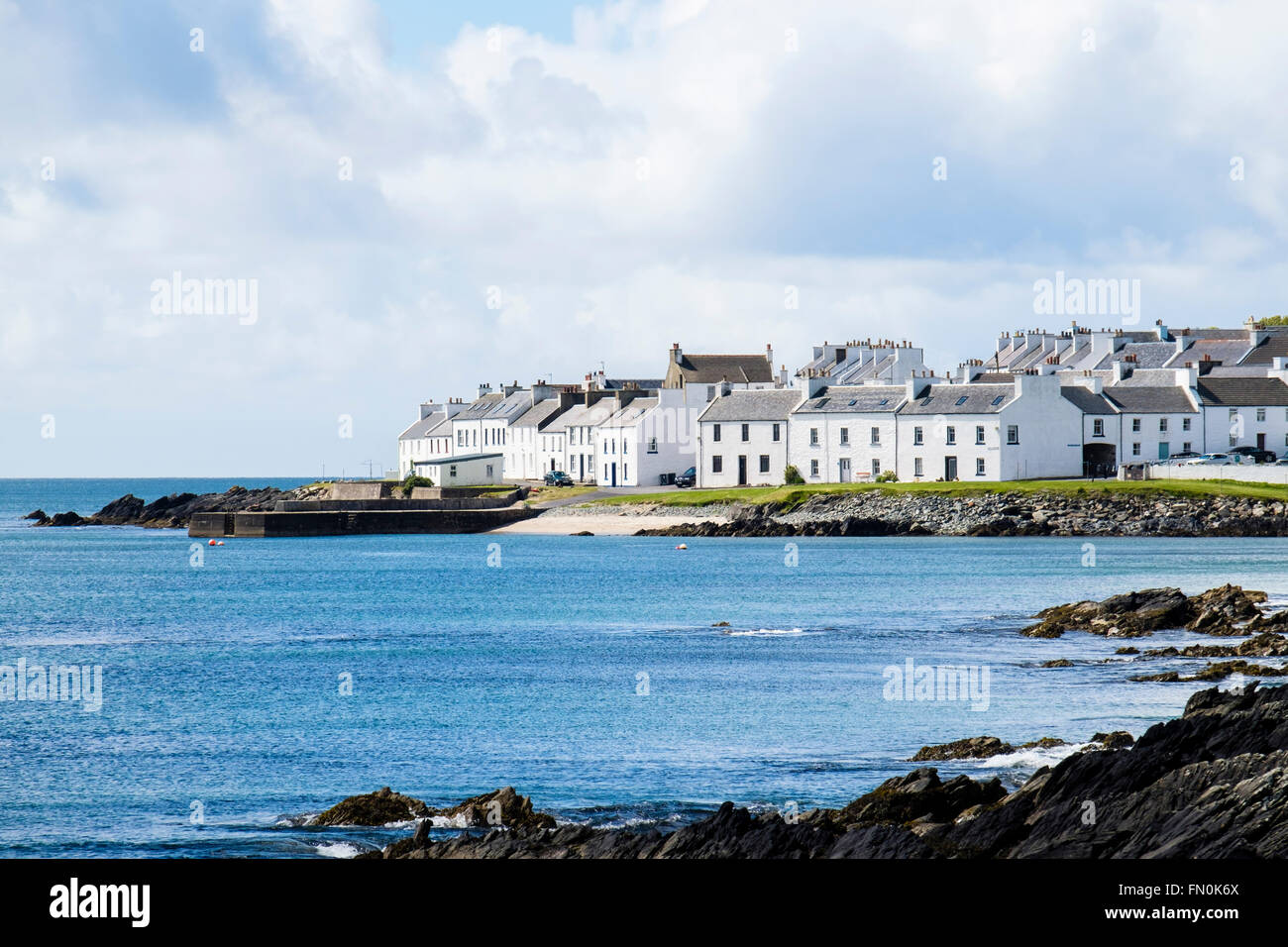 View across bay in Loch Indaal to Scottish village of Port Charlotte on Isle of Islay Inner