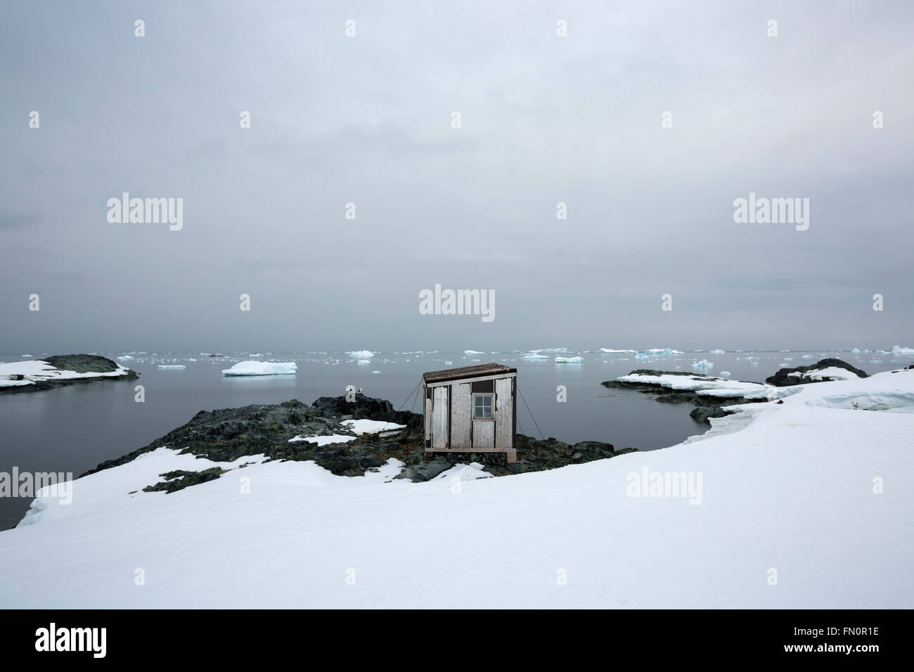 Antarctica, Antarctic peninsula, Detaille Island also known as Detail Island near Antarctic Circle, with hut. Stock Photo