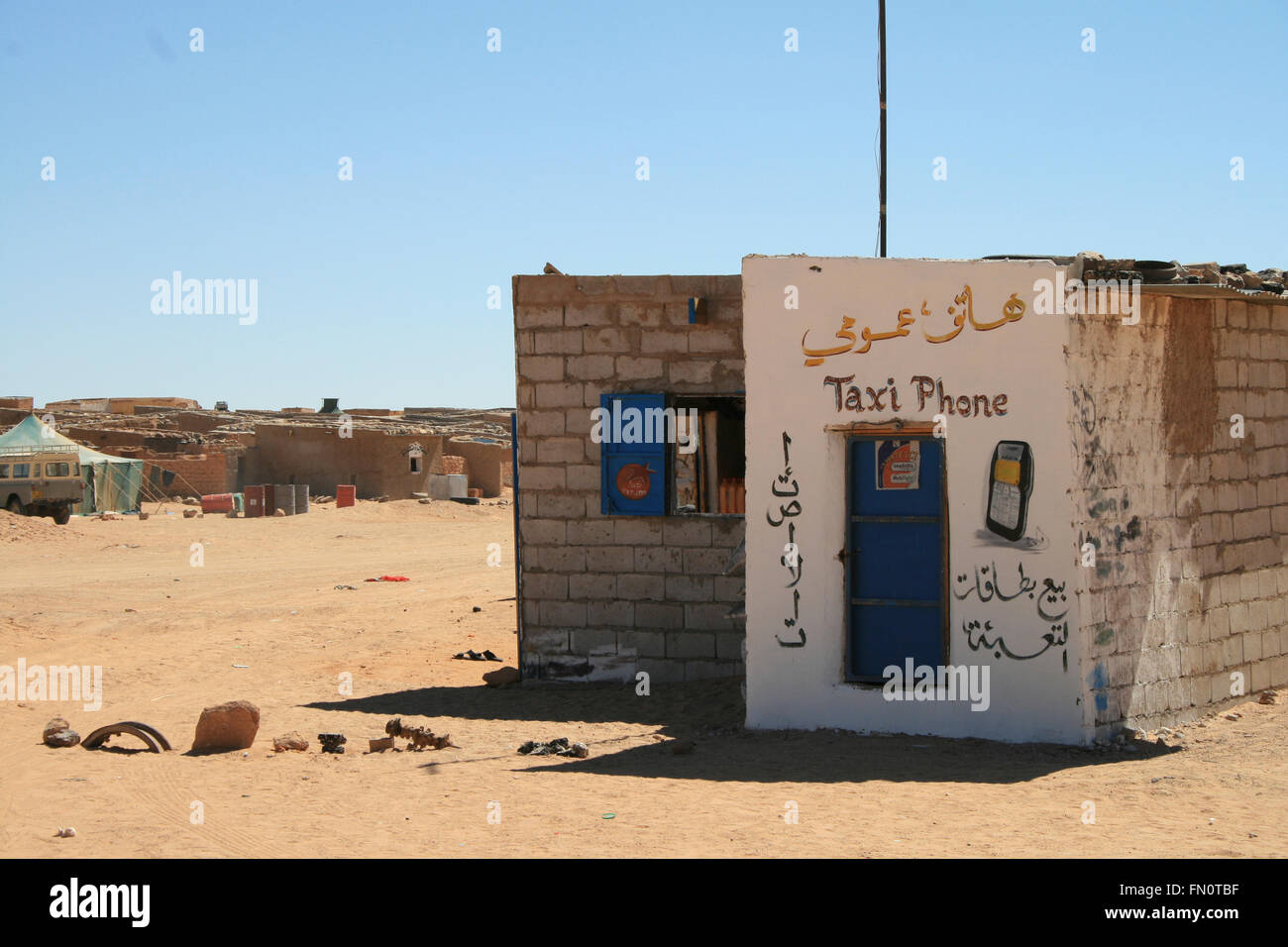 Taxi phone shop in Tindouf's refugee camp in sahara desert Stock Photo