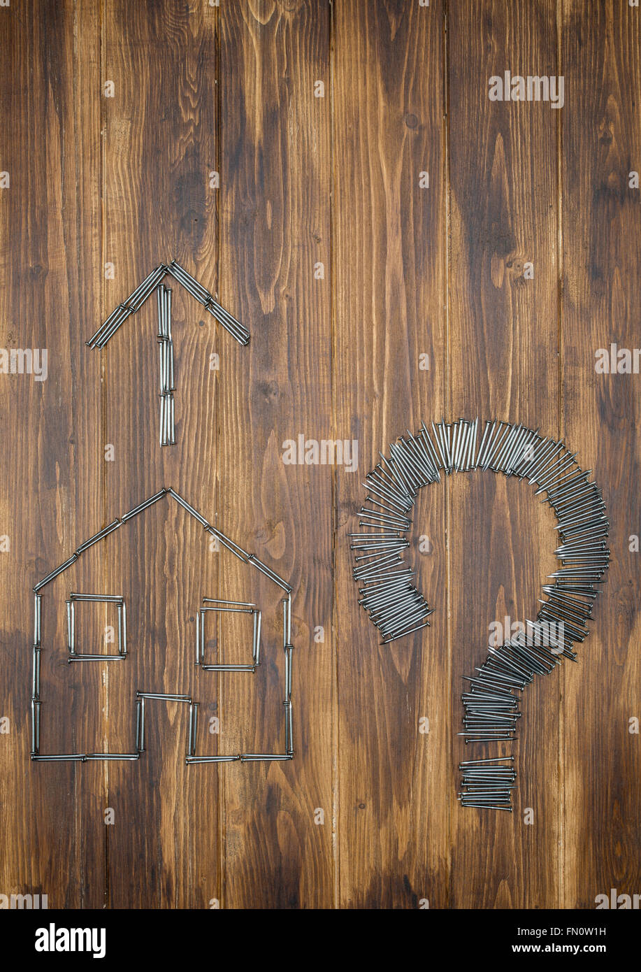 move house question, house price rises, housing market hike, Group of nail Stock Photo