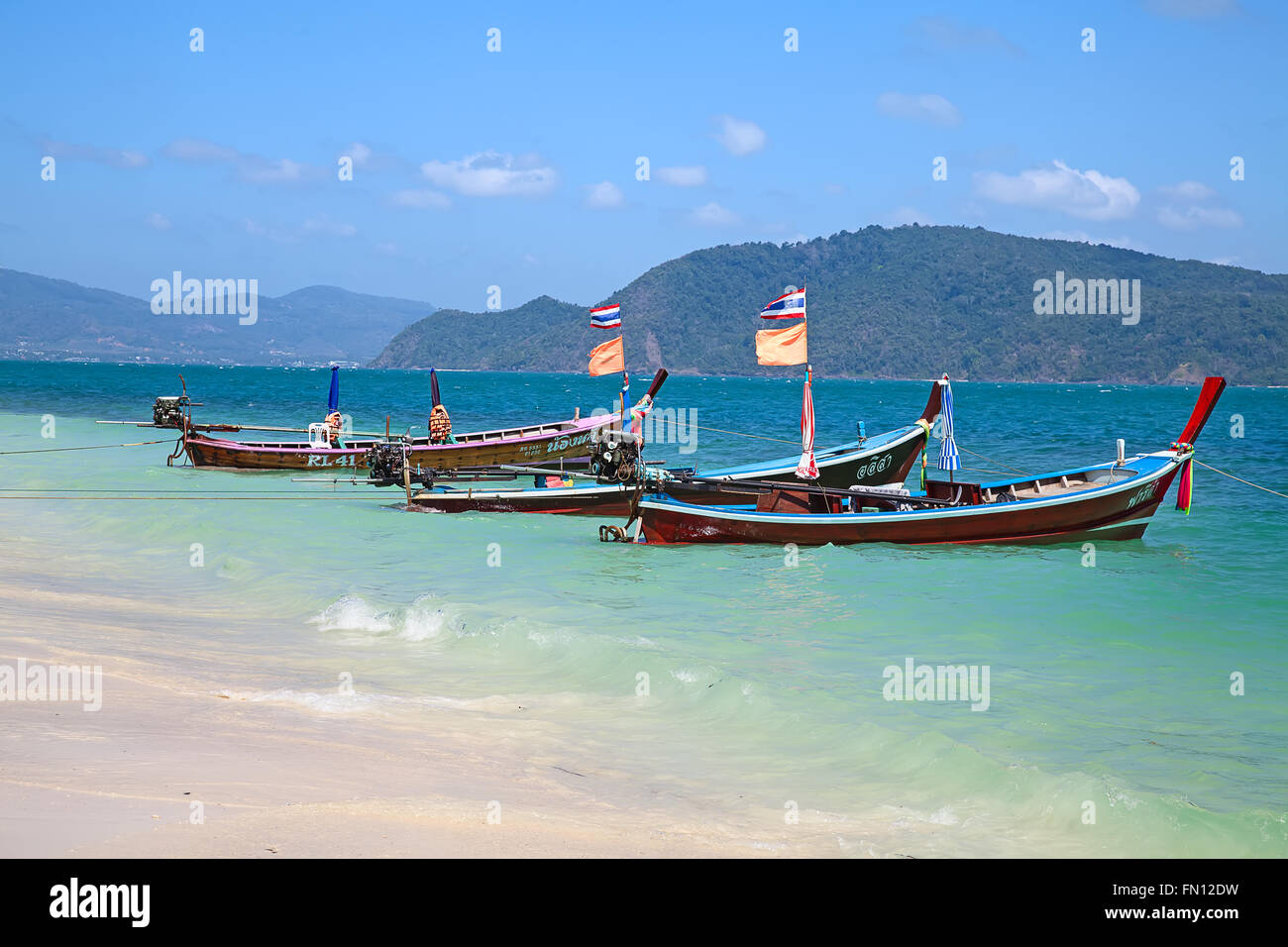 Thai long tail boat on the shore Stock Photo