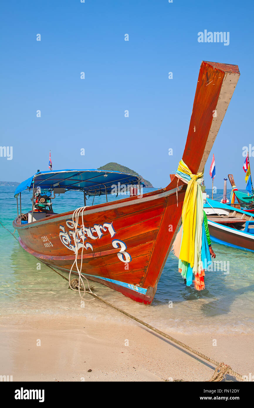 Thai long tail boat on the shore Stock Photo