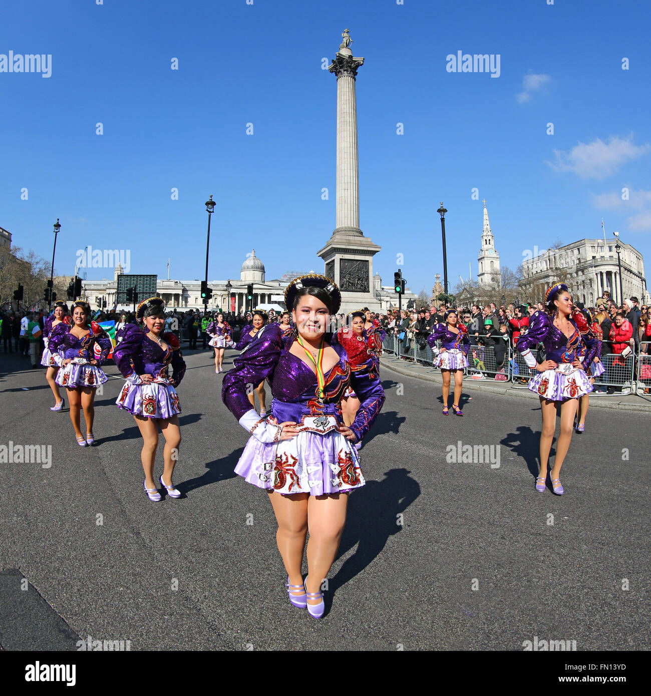 London, UK. 13th March 2016. Participants in the St Patrick's Day Parade 2016 at Trafalgar Square with Nelson's Column in London Credit:  Paul Brown/Alamy Live News Stock Photo