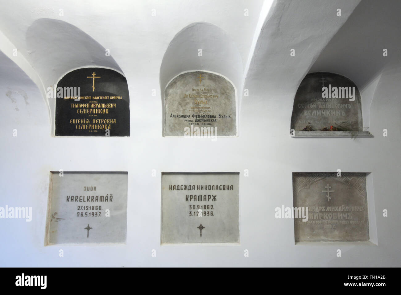 Graves of Karel Kramar, the first Prime Minister of Czechoslovakia, and his Russian wife Nadezhda Kramar in the underground crypt of the Dormition Church at the Olsany Cemetery in Prague, Czech Republic. Karel Kramar, born on December 17, 1860, was a Czech (Bohemian) politician and the first Prime Minister of Czechoslovakia from November 1918 to July 1919. He died at age 76 on May 26, 1937, and was buried next to his Russian wife Nadezhda Kramar, who died five months earlier. Nadezhda Nikolayevna Kramar (Kramarova), nee Khludova, later Abrikosova after her first husband, was born on September Stock Photo