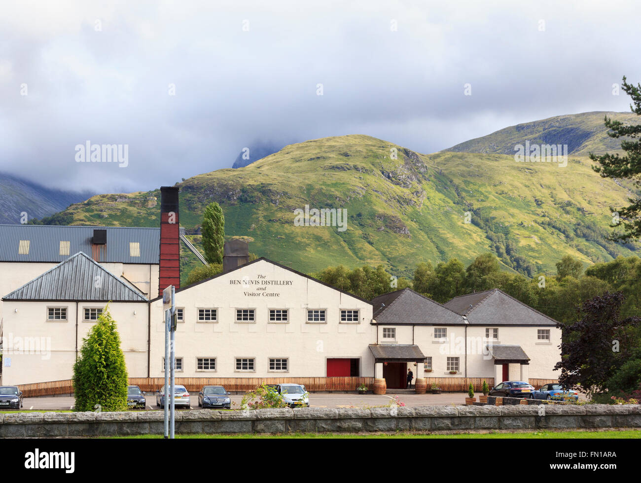 Beneath the mountain itself, shrouded by clouds, on the edge of Fort