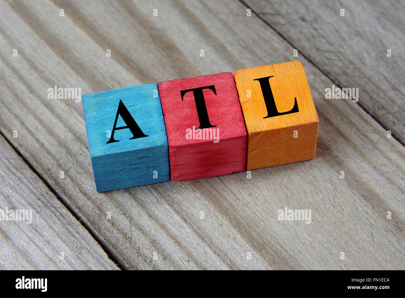 ATL (Atlanta airport code) acronym on colorful wooden cubes Stock Photo Alamy