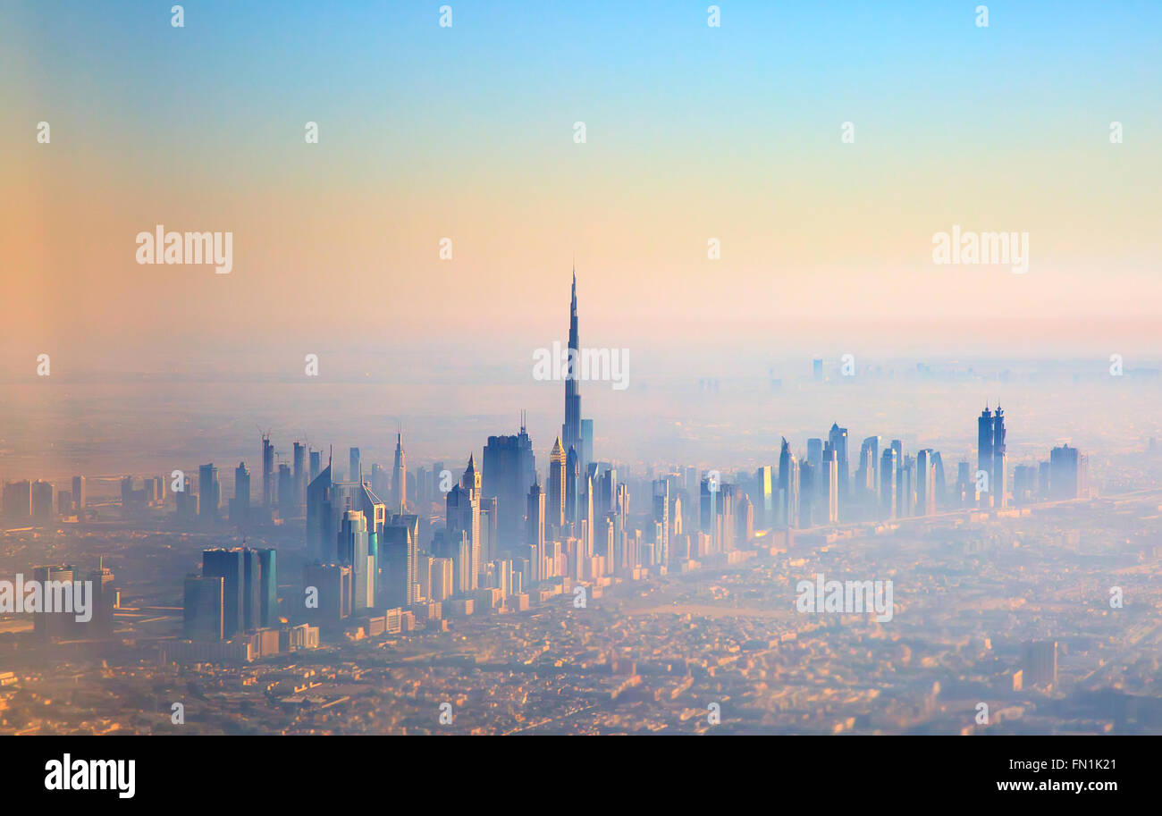 DUBAI, UAE - FEBRUARY 20: Sunset over downtown Burj Dubai February 20, 2016 in Dubai, United Arab Emirates. Dubai is biggest cit Stock Photo
