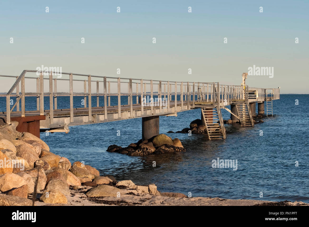 Bathing jetty at low tide near the small town Hou, Denmark Stock Photo