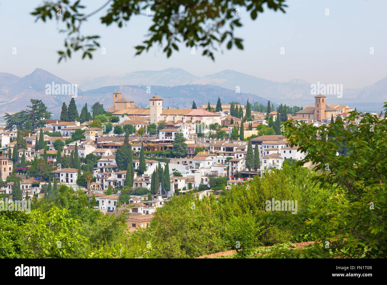 Granada - The look to The Albayzin district and Saint Nicholas church from Generalife gardens of Alhambra palace. Stock Photo