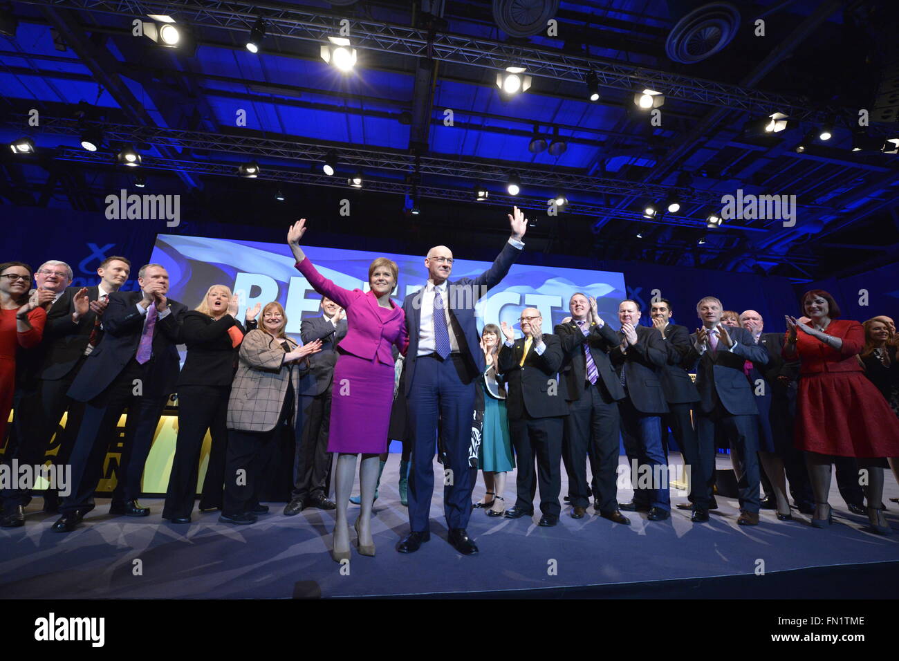 Glasgow, Scotland, GBR - 13  March: Nicola Sturgeon, First Minister of Scotland and SNP Leader and John Swinney, Depute Leader,  with current and prospective MSPs on the final day of the  Scottish National Party Spring Conference took place Sunday 13 March 2016 in Glasgow, Scotland. Stock Photo