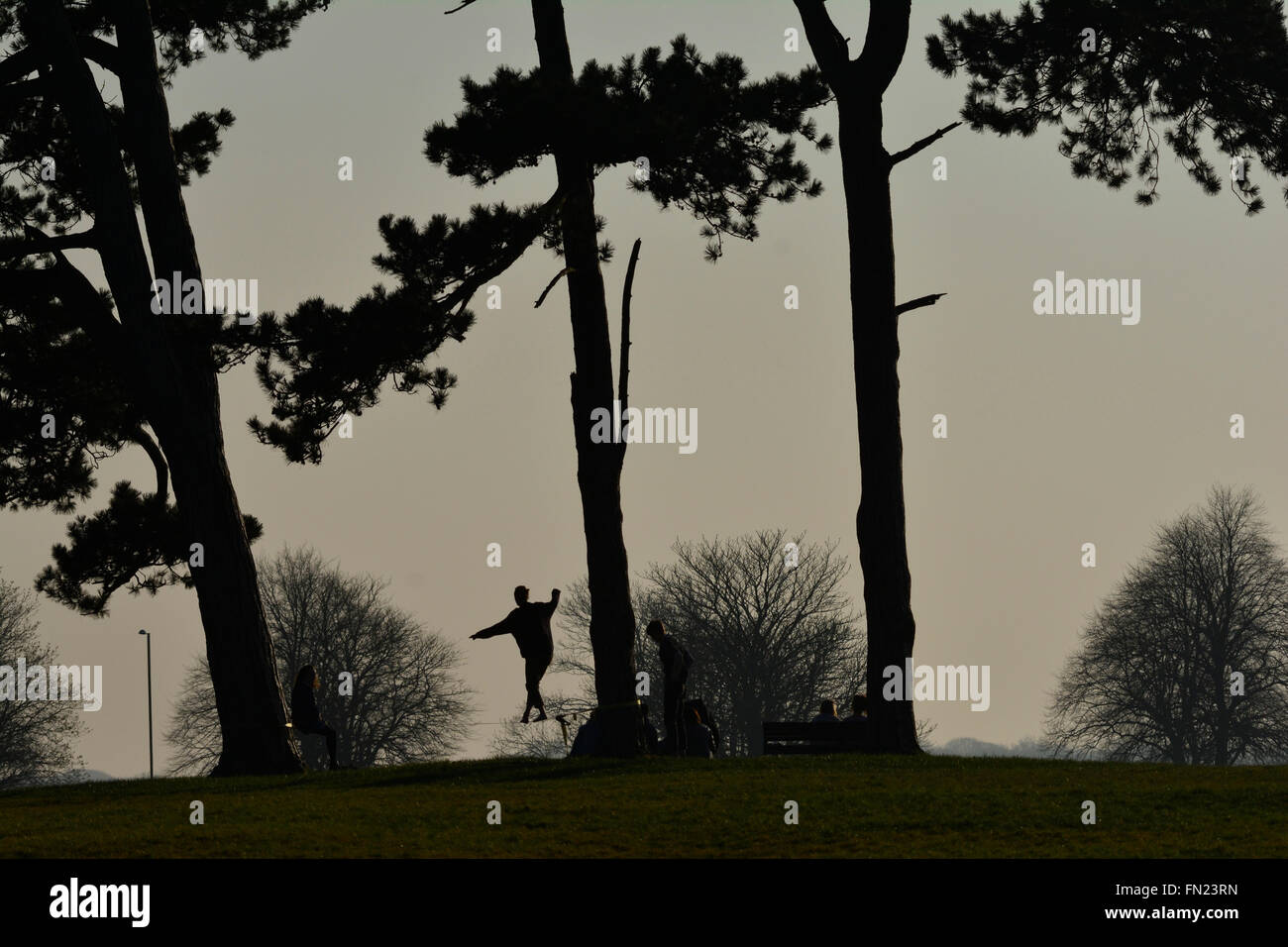Act of walking along a suspended rope hi-res stock photography and ...
