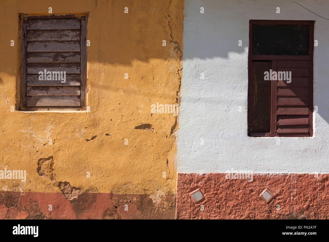 Details of different window shutters and walls of buildings at Trinidad