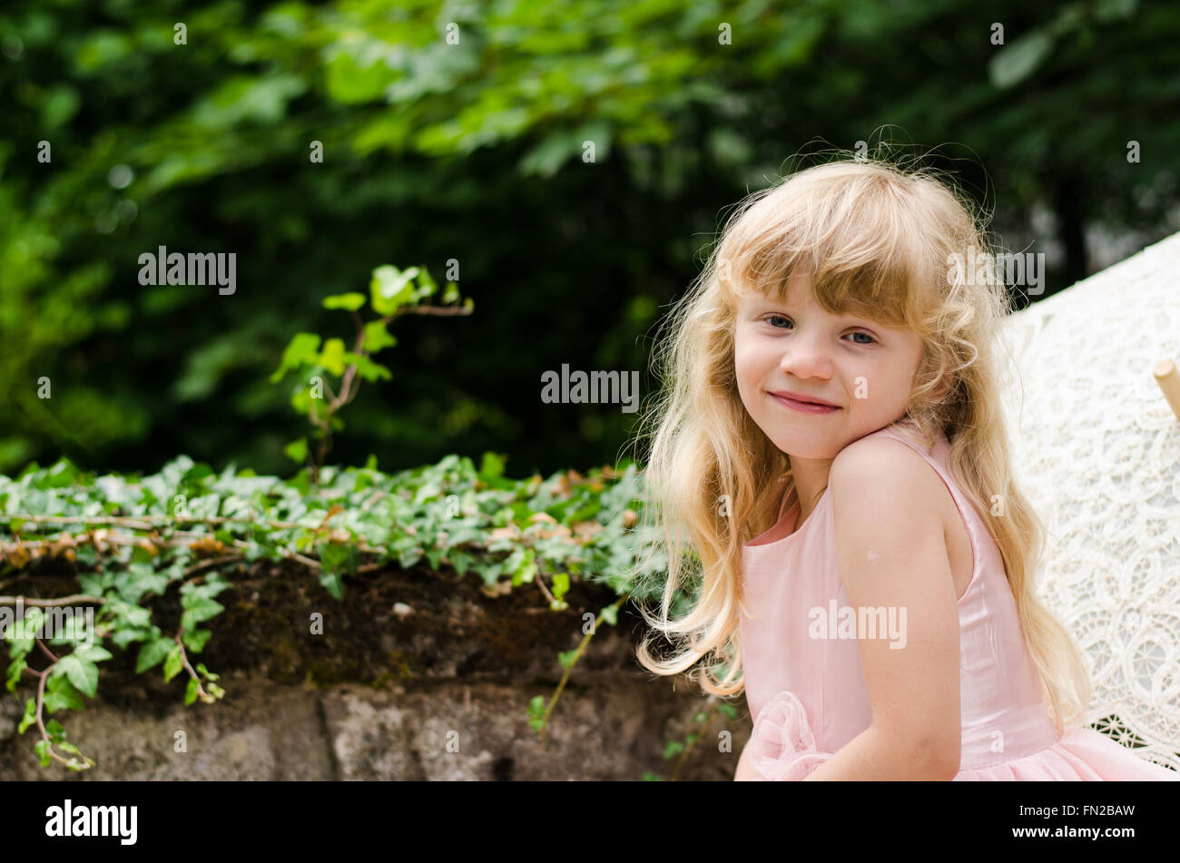 little blond child with long hair portrait Stock Photo