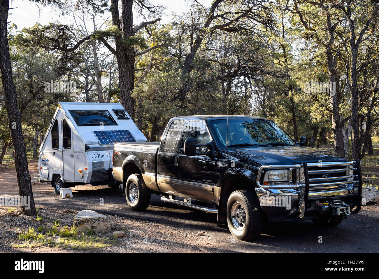 GRAND CANYON NATIONAL PARK, USA, May 29, 2015: Teardrop camping trailer and pick-up truck at a Grand Canyon campground. Stock Photo