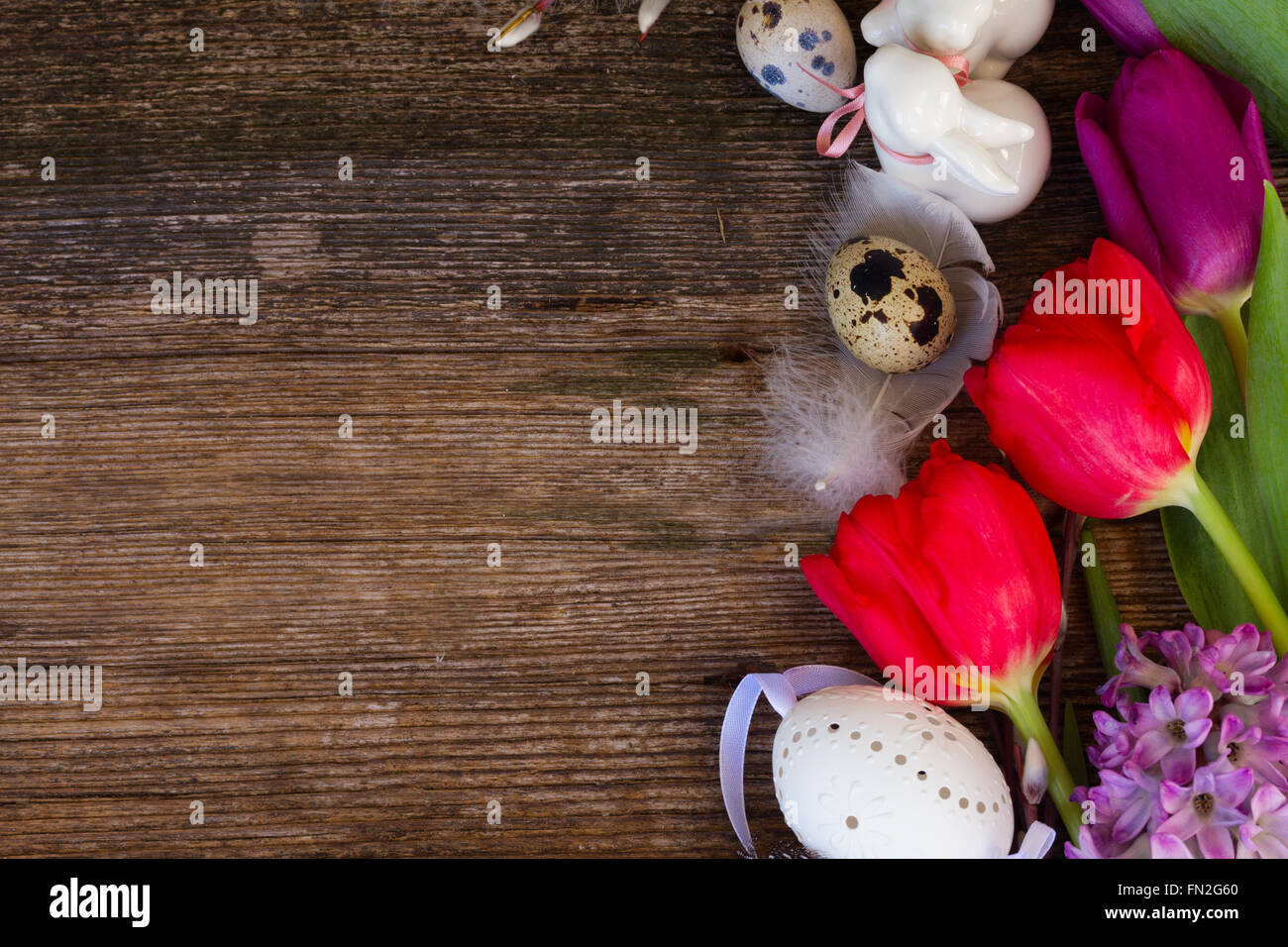 Spring flowers with easter eggs Stock Photo - Alamy