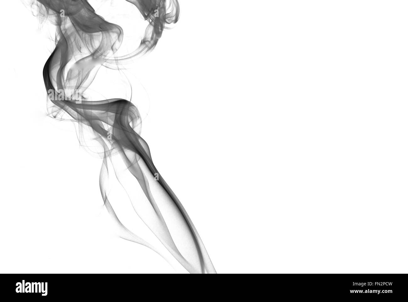 A thick streak of black, grainy smoke isolated on white background with the effect of the graphic as an abstract background, Stock Photo
