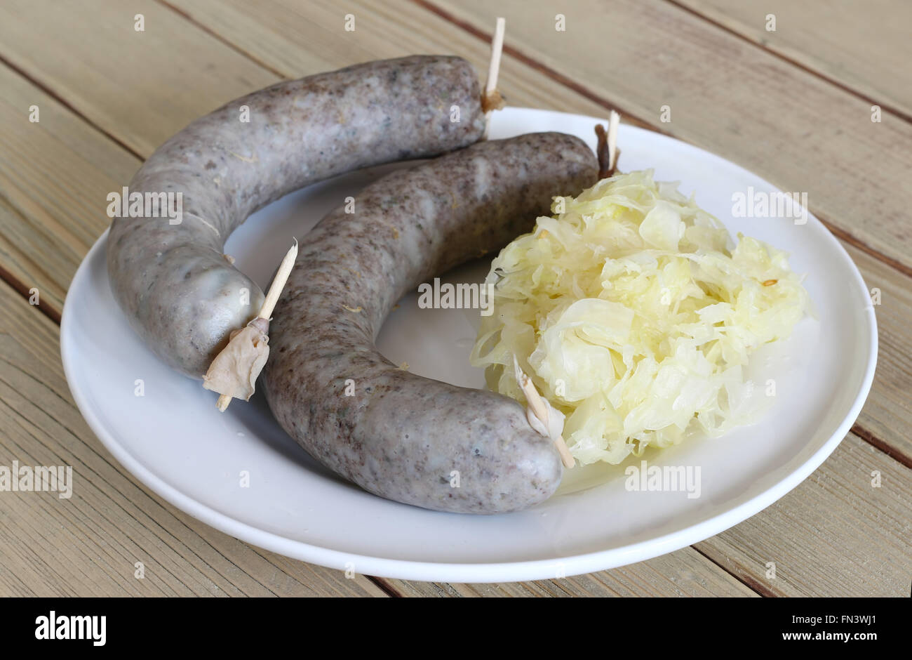 Sausage with sauerkraut - favorite hog killing delicacy Stock Photo