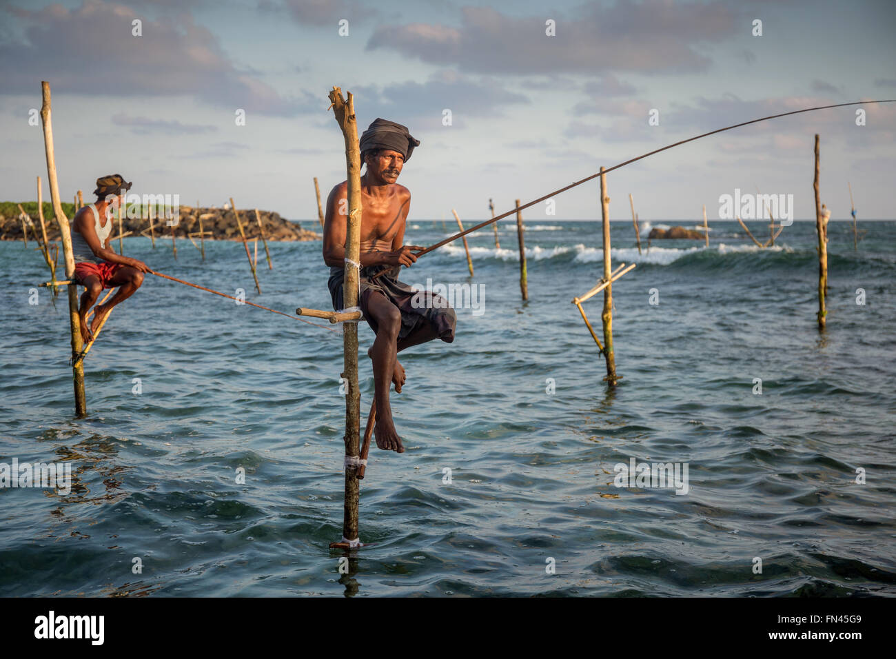 Sri Lankan stilt fishing, Sri Lankan stilt fishermen at sunset, Koggala