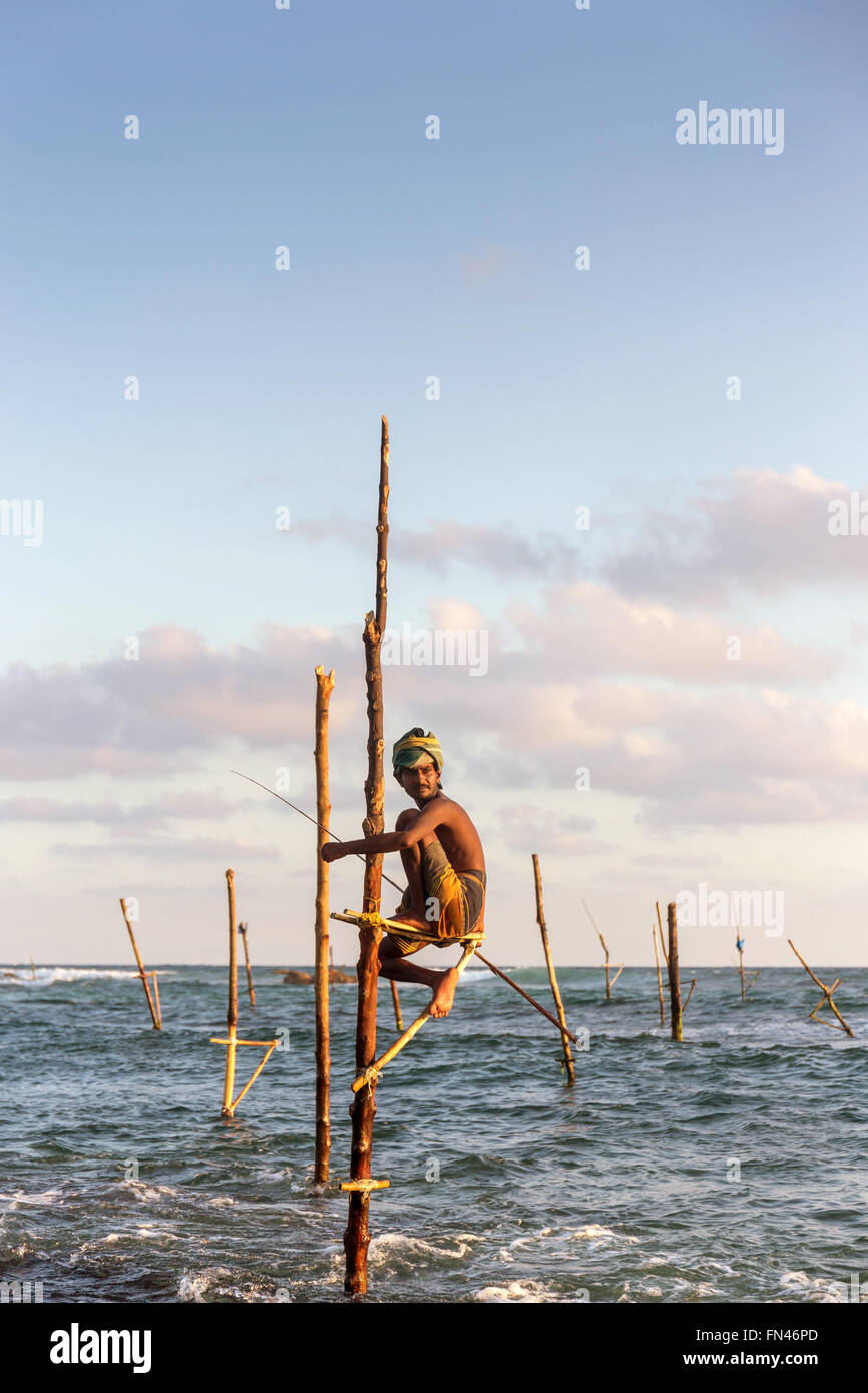 Sri Lankan stilt fishing, Sri Lankan stilt fishermen at sunset, Koggala ...