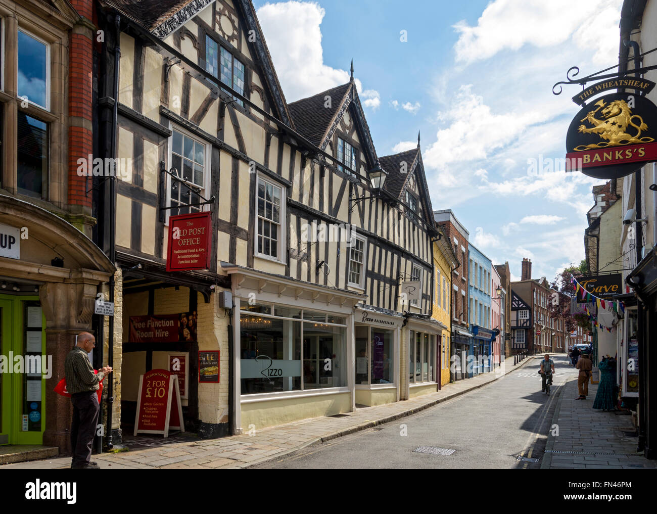 The Old Post Office inn and other timber-framed buildings on Milk Street, Shrewsbury, Shropshire, England, UK Stock Photo