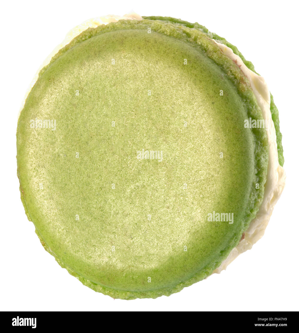 green macaroon isolated on white background. Stock Photo