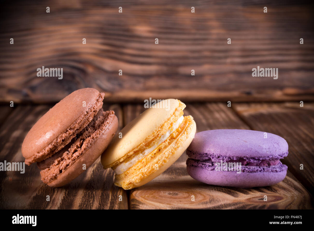 macaroons on the wooden background. Stock Photo