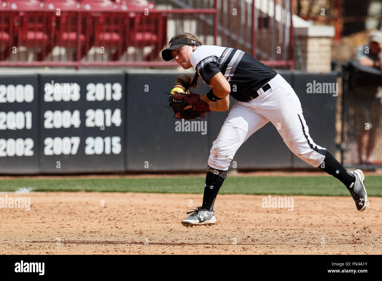 Columbia, SC, USA. 13th Mar, 2016. Kenzi Maguire (2) of the South Carolina Gamecocks sidearms a throw to first for the out in the NCAA Softball match-up between the Kentucky Wildcats and the South Carolina Gamecocks at Beckham Field in Columbia, SC. Scott Kinser/CSM/Alamy Live News Stock Photo