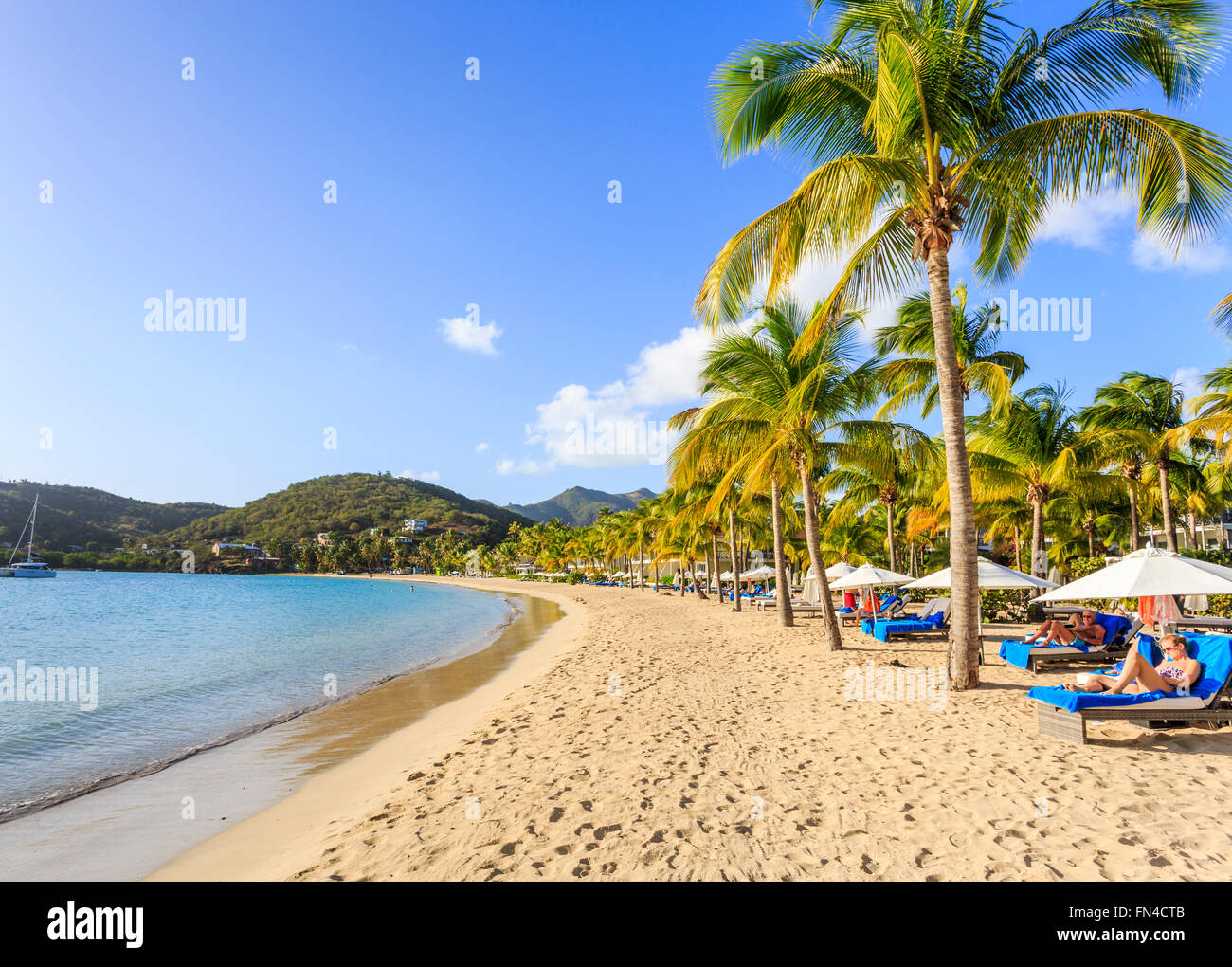 Sunny Golden Sandy Beach And Azure Sea At Carlisle Bay South West Antigua Antigua And Barbuda West Indies Under A Blue Sky Stock Photo Alamy