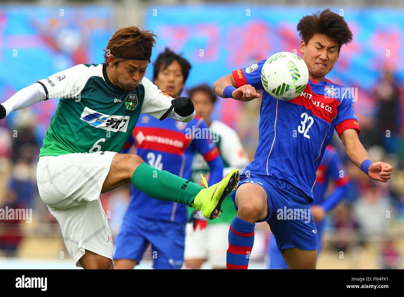 Sagamihara Gion Stadium, Kanagawa, Japan. 13th Mar, 2016. (LR) Sunao