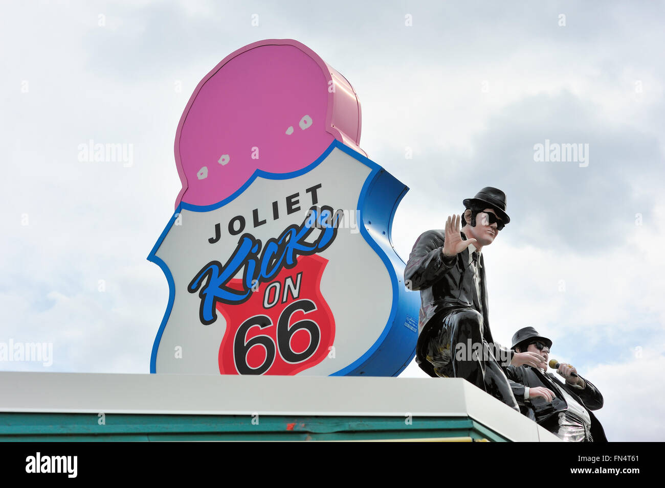 A drive-in restaurant featuring statues of the Blues Brothers on roof along with a sign linking it to the historic Route 66. Joliet, Illinois, USA. Stock Photo