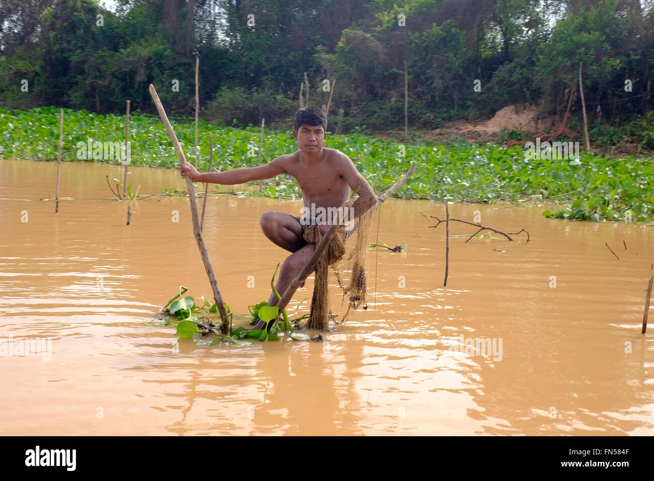 Cambodian Fisherman near Fishing Village of Kampong Kleang, Cambodia Stock Photo