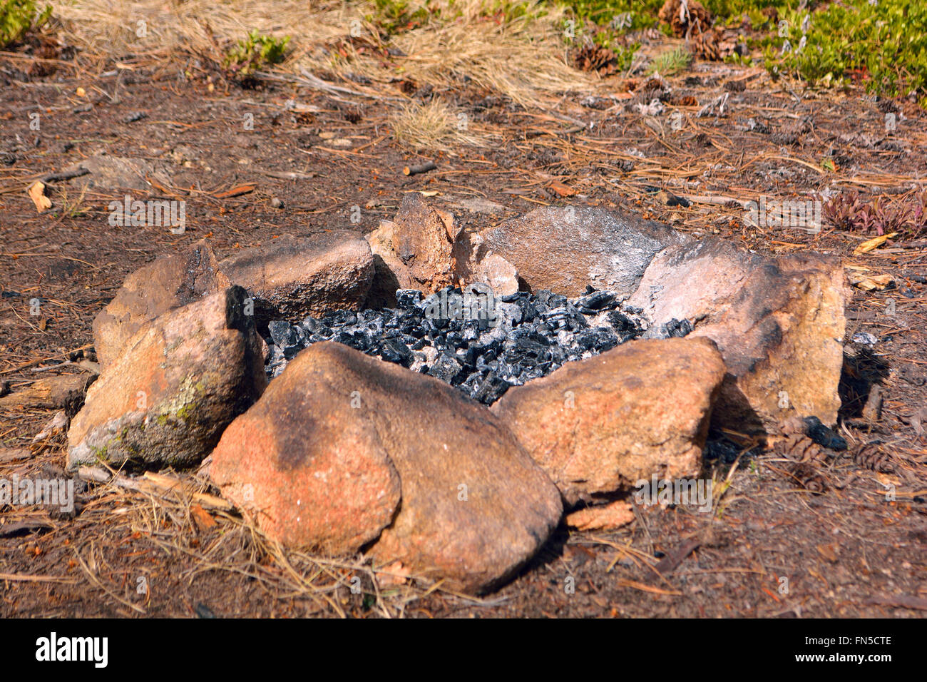 Camp Fire Rock Circle With Ash And Burnt Wood Stock Photo Alamy