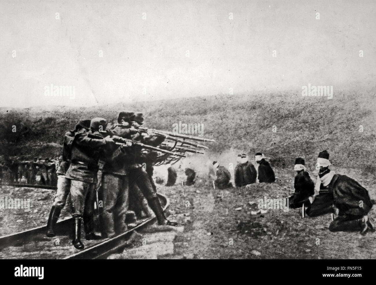 Serbian prisoners of war are arranged in a semi-circle and executed by an Austrian firing squad, 1917 (World War I). Stock Photo