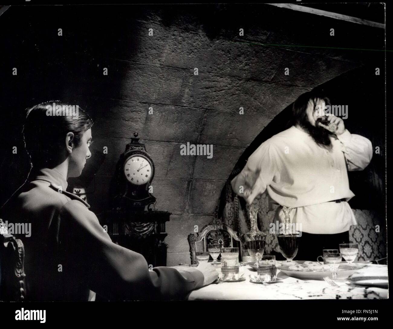 1968 - Rasputin (Gert Frobe) drinking while Prince Yussupoff played by Peter McEnery waits for the monk to help himself to poisoned cake. © Keystone Pictures USA/ZUMAPRESS.com/Alamy Live News Stock Photo