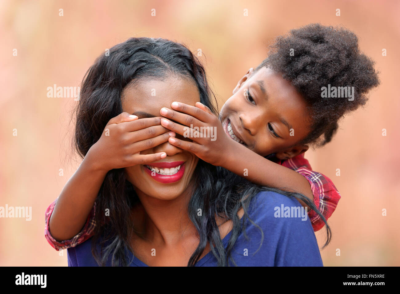 Mother and Child Playing Outdoors Stock Photo