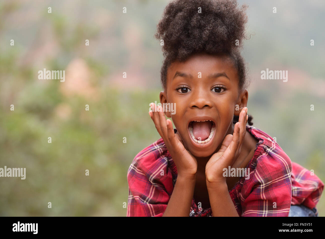 Happy Child playing in a park Stock Photo - Alamy