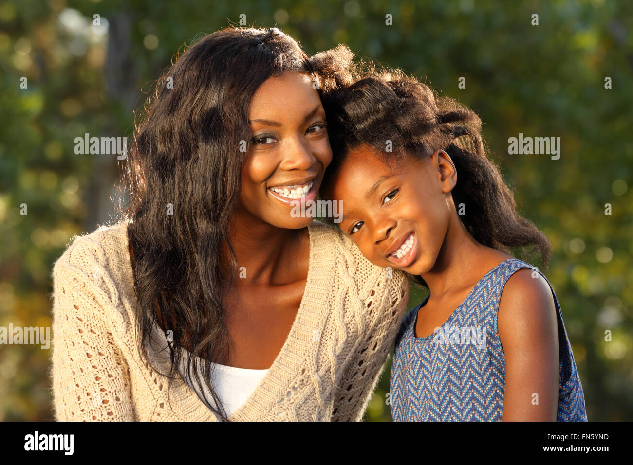 Happy Mother and Child Spending Time Together in a Park Stock Photo