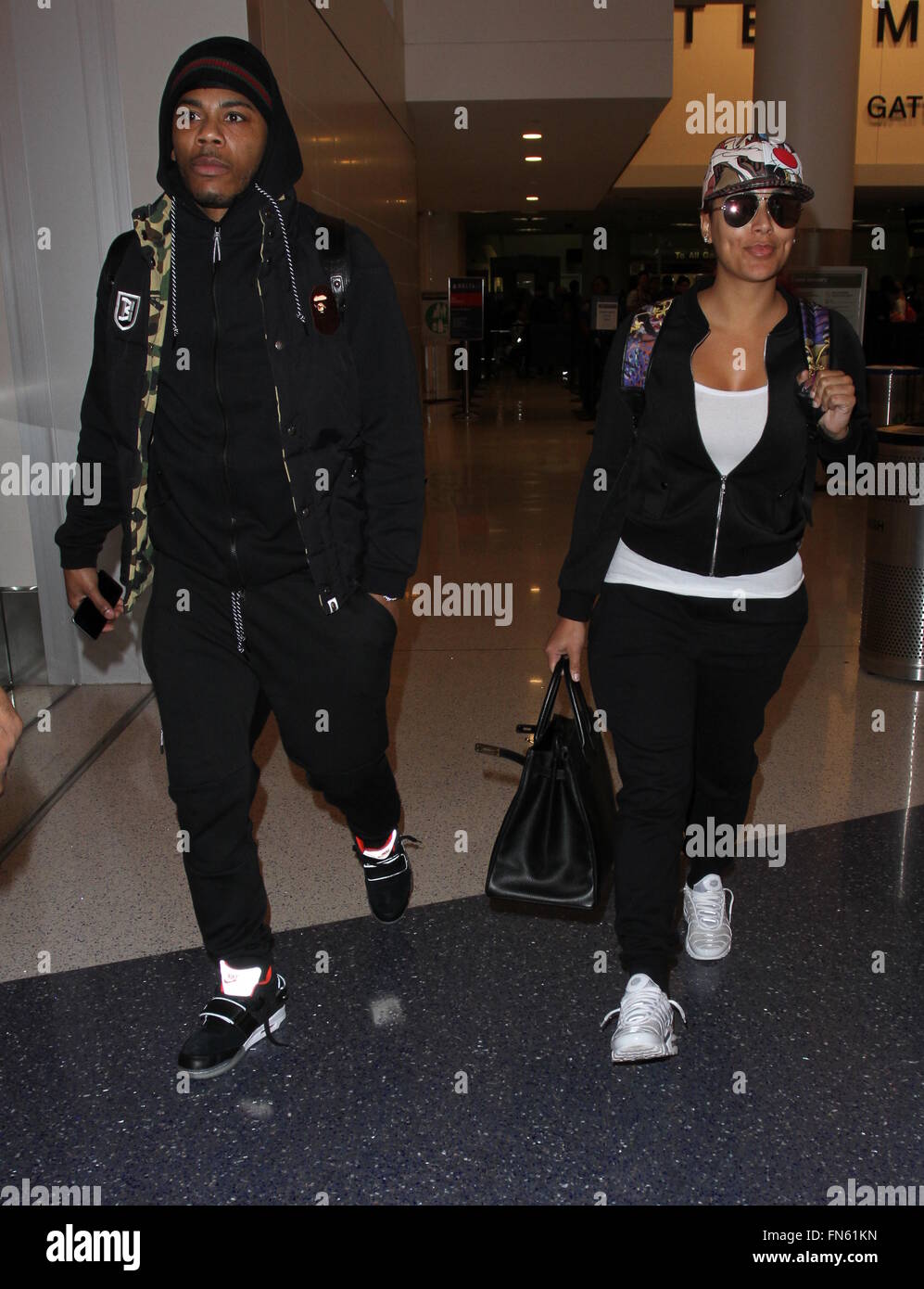 Rapper Nelly arrives on a flight to Los Angeles International Airport (LAX)  Featuring: Nelly, Shantel Jackson Where: Los Angeles, California, United  States When: 11 Feb 2016 Stock Photo - Alamy