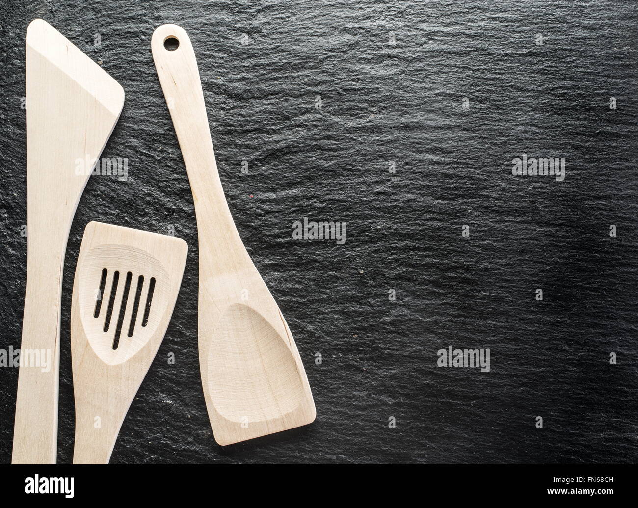 Kitchen utensils on the graphite background. Stock Photo