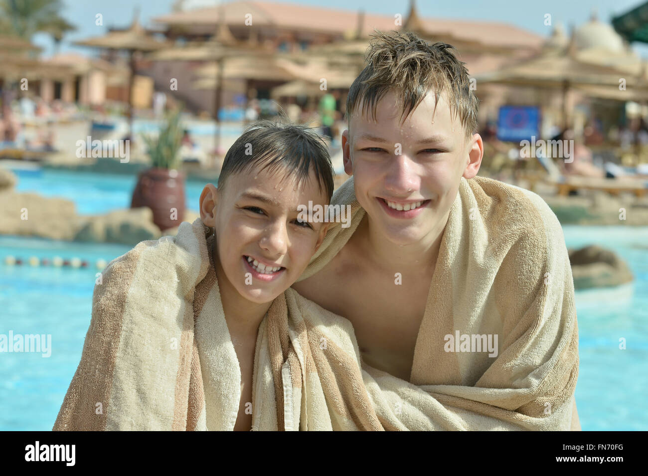 happy boys near the pool Stock Photo