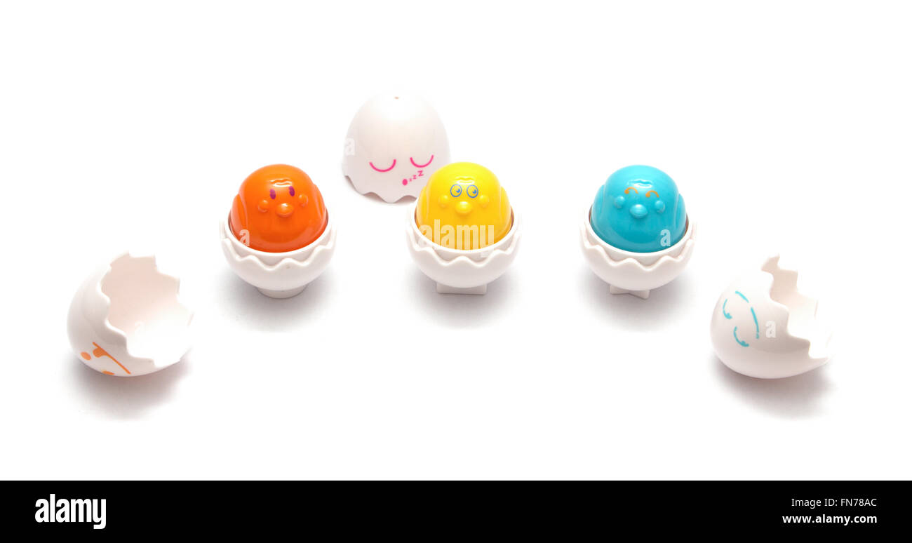 Easter colorful plastic eggs with chickens isolated Stock Photo