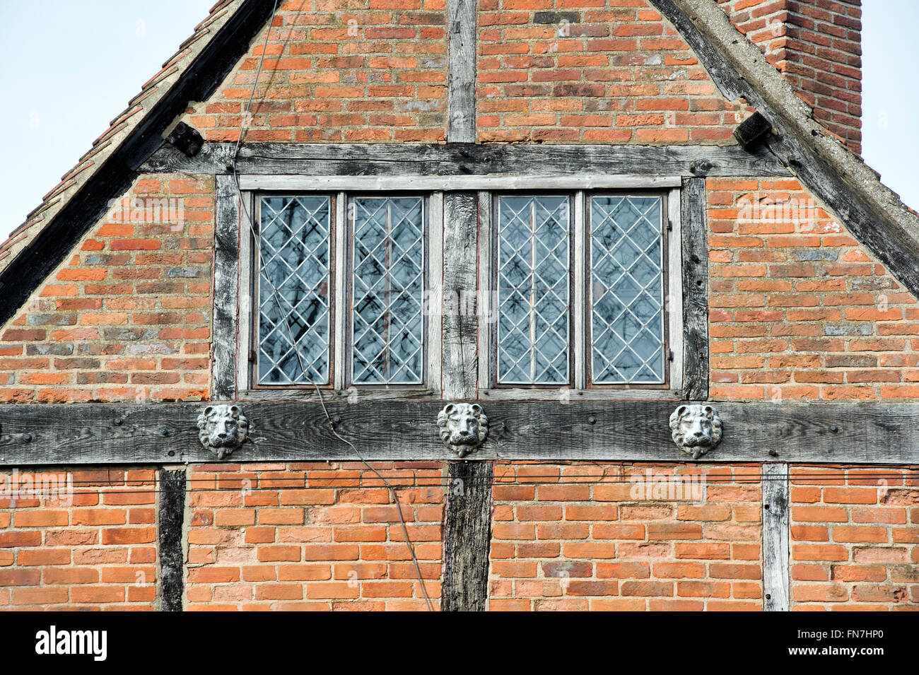 Lion moulding detail on the gable end of a timber framed house in Dorchester on Thames, Oxfordshire, England Stock Photo