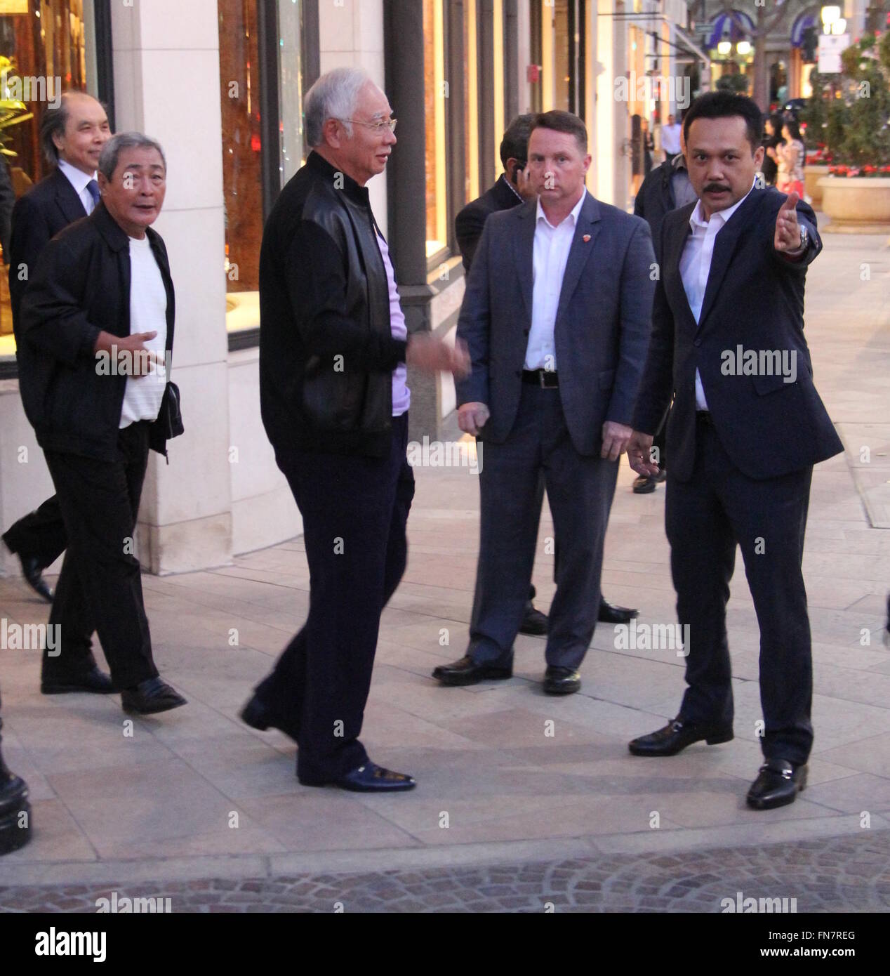 Malaysian Prime Minister Najib Razak seen shopping on Rodeo Drive in Beverly Hills with his large entourage.  Featuring: Najib Razak Where: Beverly Hills, California, United States When: 11 Feb 2016 Stock Photo