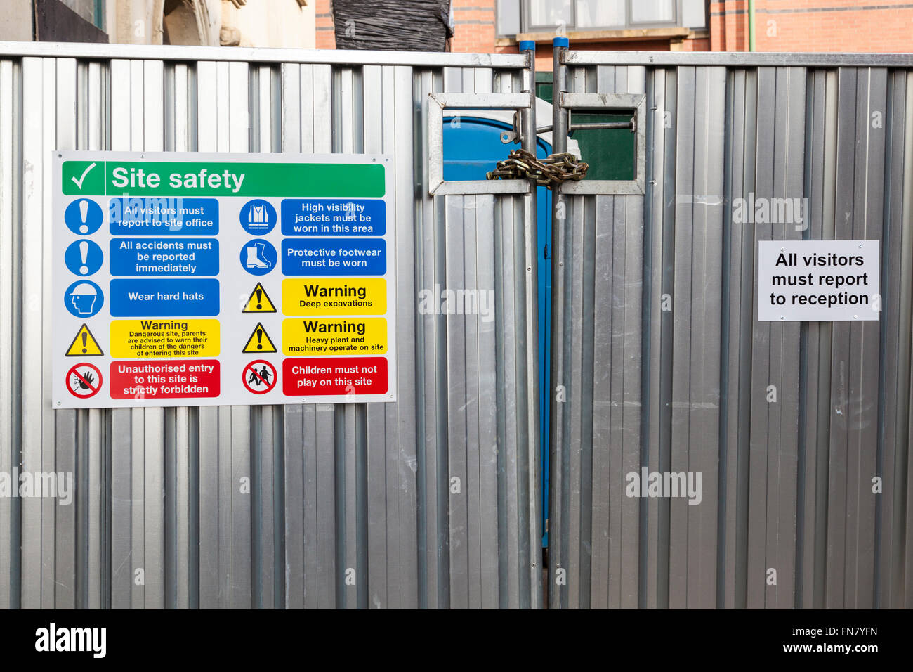 Site safety notices on construction site fencing, Nottingham, England, UK Stock Photo