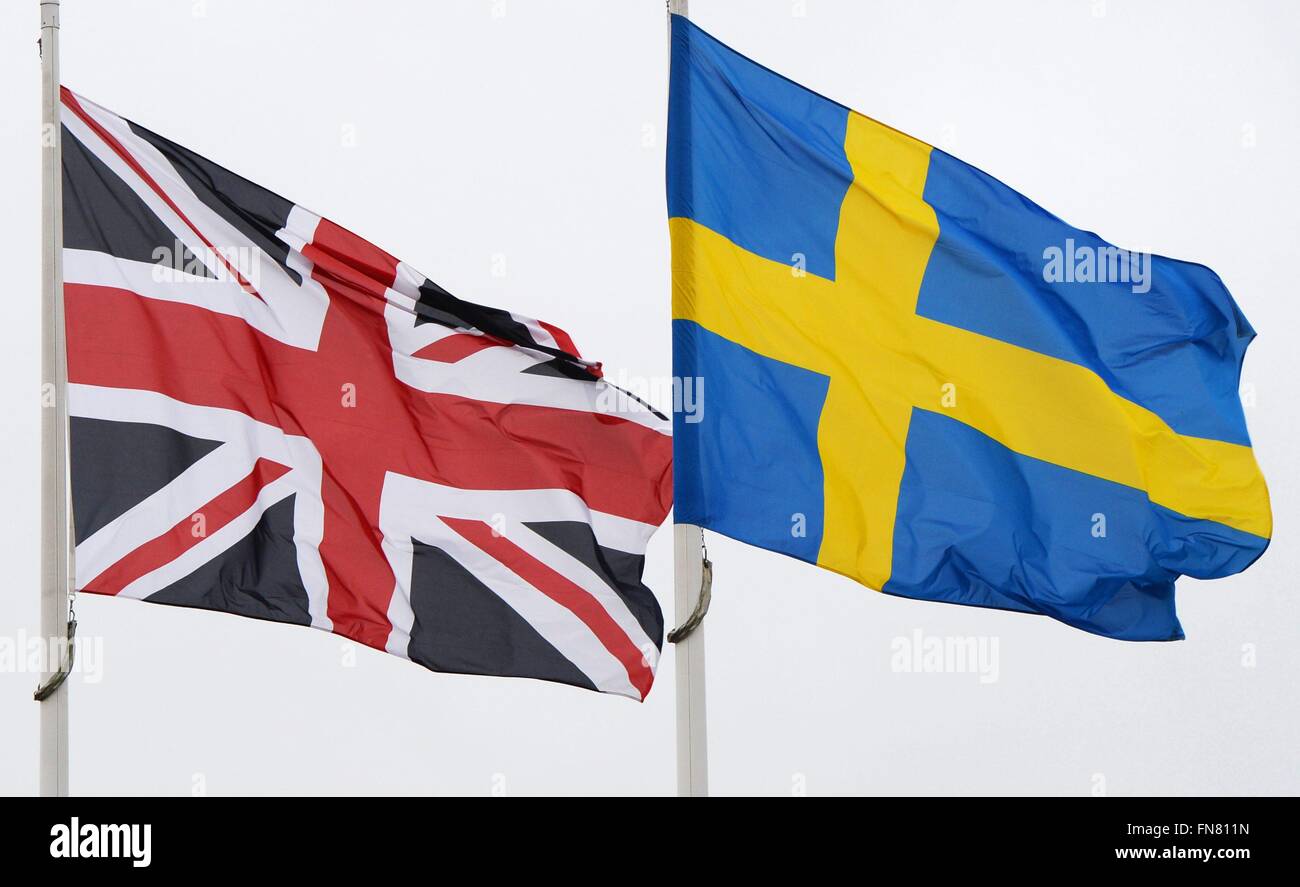 The British and swedish flag are waving in Luxembourg, Jan. 8, 2016. Stock Photo