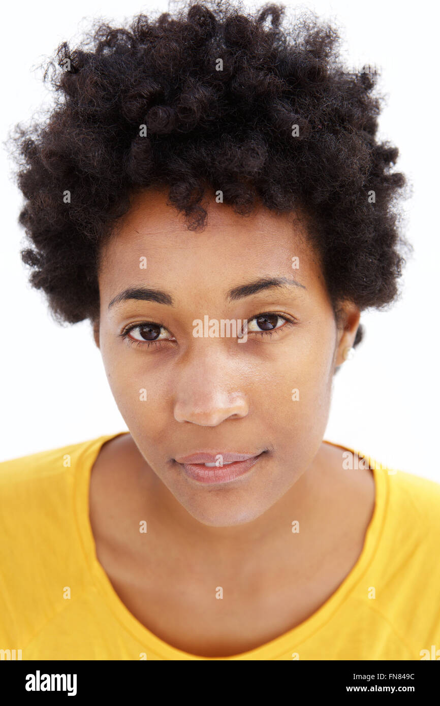 Closeup portrait of face of a young african woman staring at camera ...