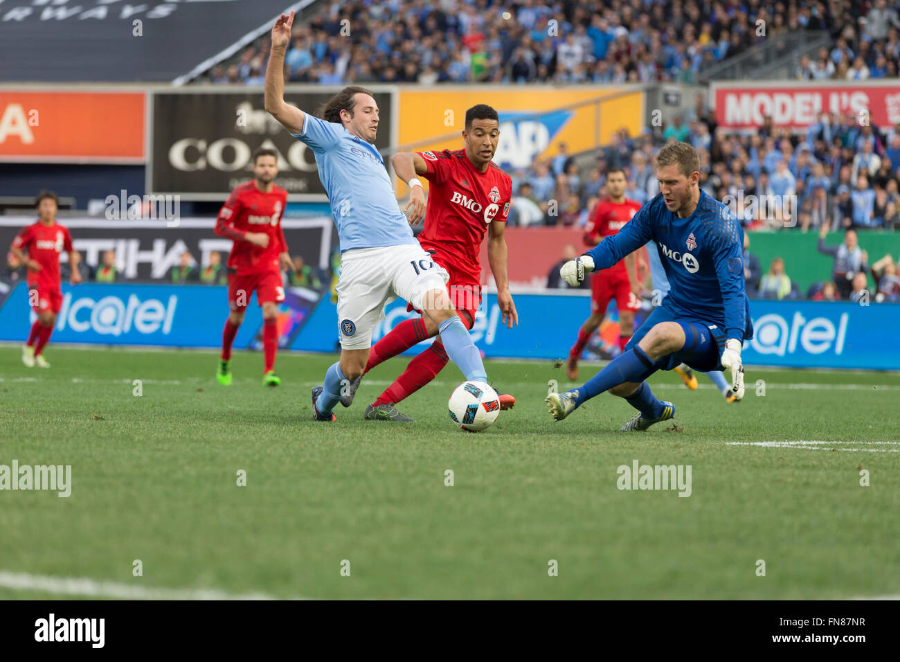 New York, NY USA - March 13, 2016: Mix Diskerud (10) of New York City FC fights for ball during game on Yankee stadium Credit:  lev radin/Alamy Live News Stock Photo