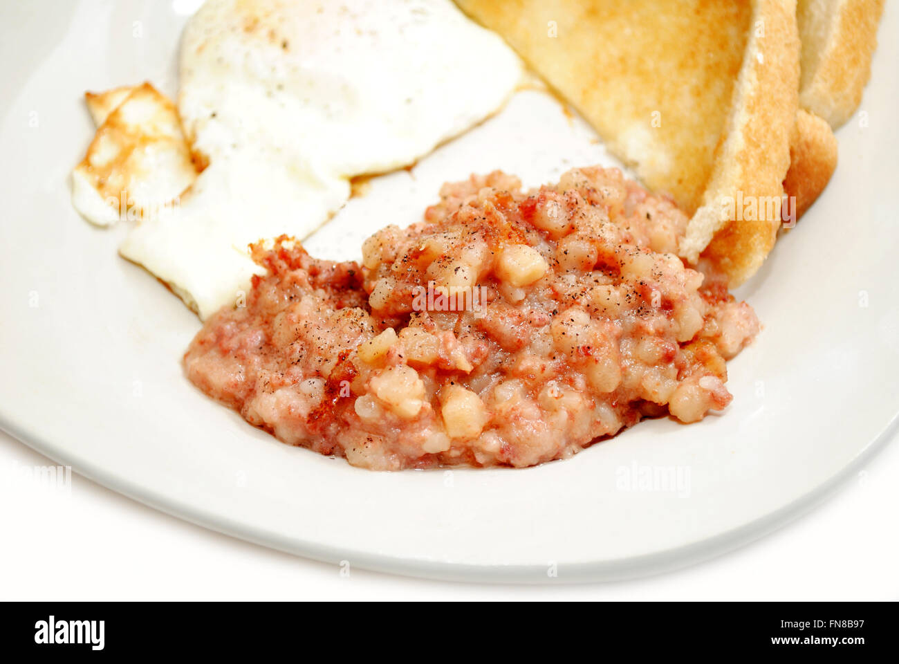 Corned Beef Hash Served with Eggs & Toast Stock Photo Alamy