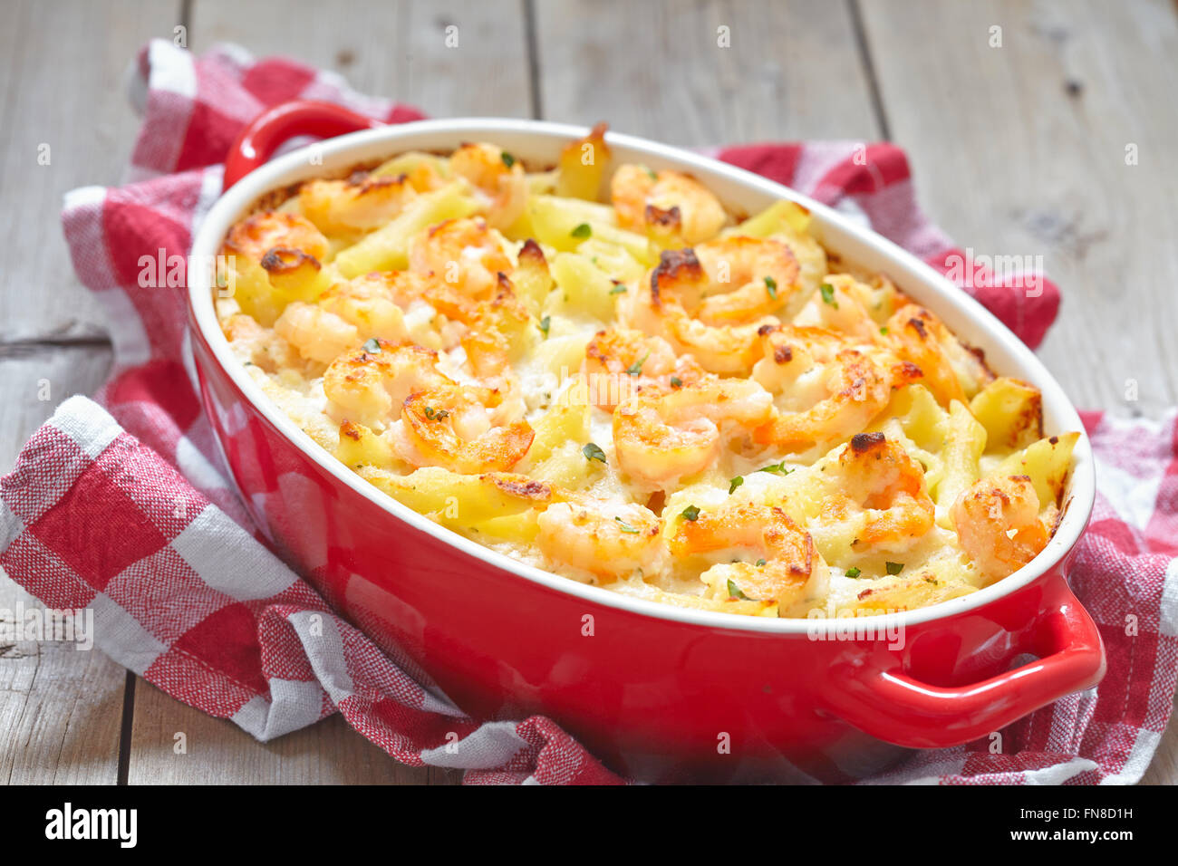 Shrimp Alfredo Penne Pasta Bake Stock Photo - Alamy